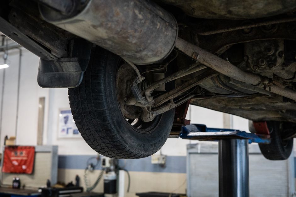 Professional tire installation on a vehicle